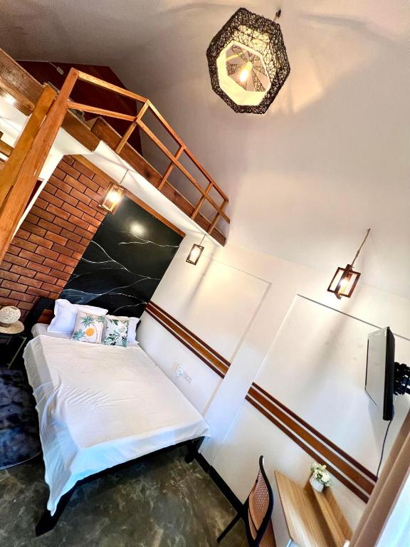 Postel nebo postele na pokoji v ubytování Hakuna Villas