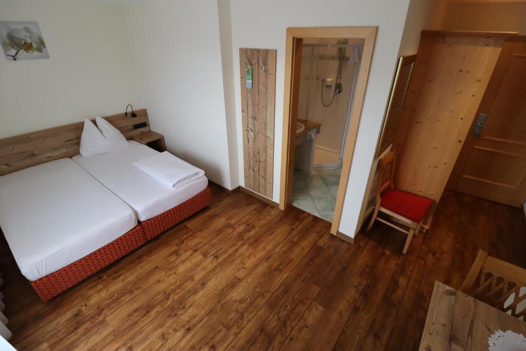 Postel nebo postele na pokoji v ubytování Ferienhotel Fuchs