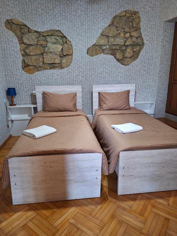 Voodi või voodid majutusasutuse Guesthouse Litoros toas