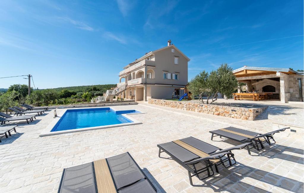 a villa with a swimming pool and a house at Beautiful Home In Slivnica With Wifi in Slivnica