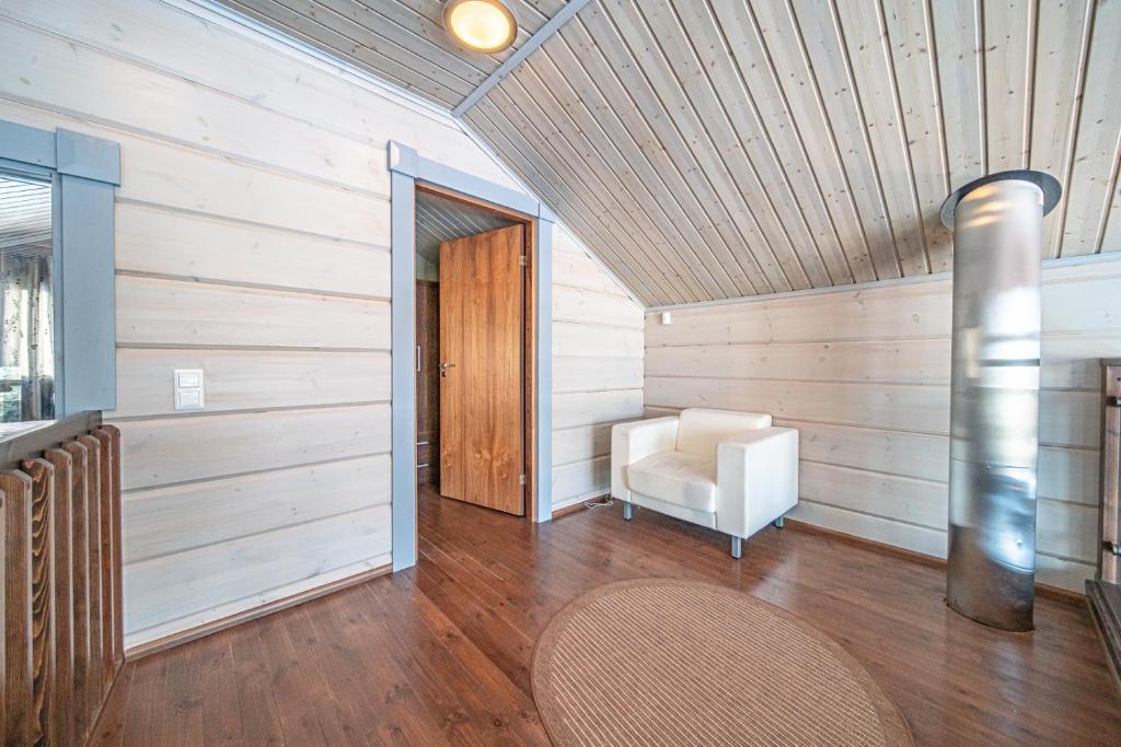 Кровать или кровати в номере Levillas Kinnastie 33 Villas