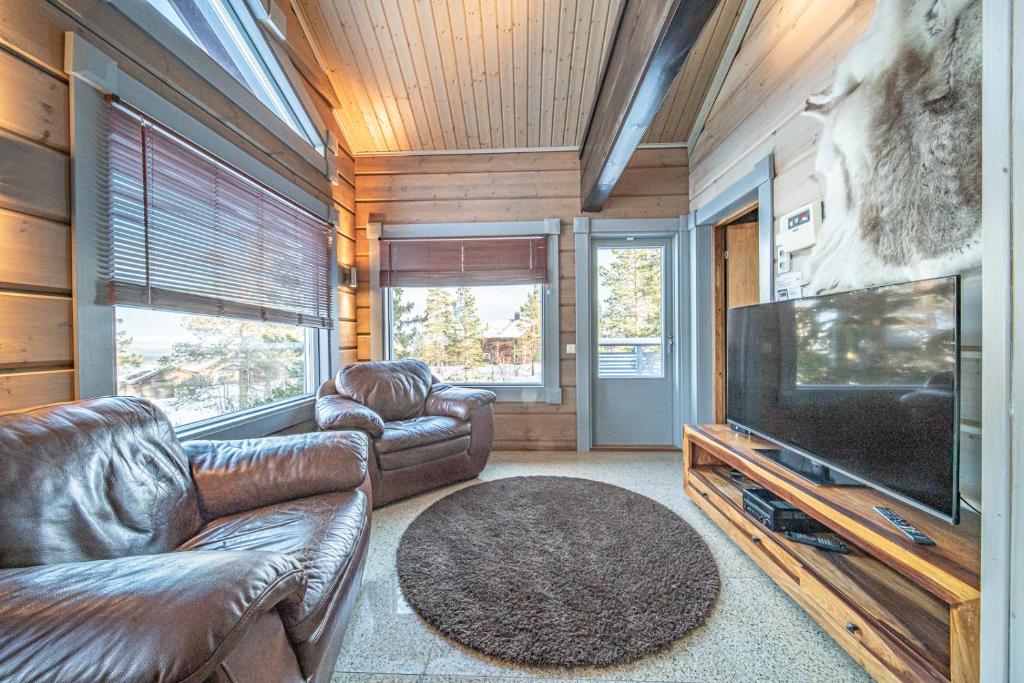 Телевизор и/или развлекательный центр в Levillas Kinnastie 33 Villas