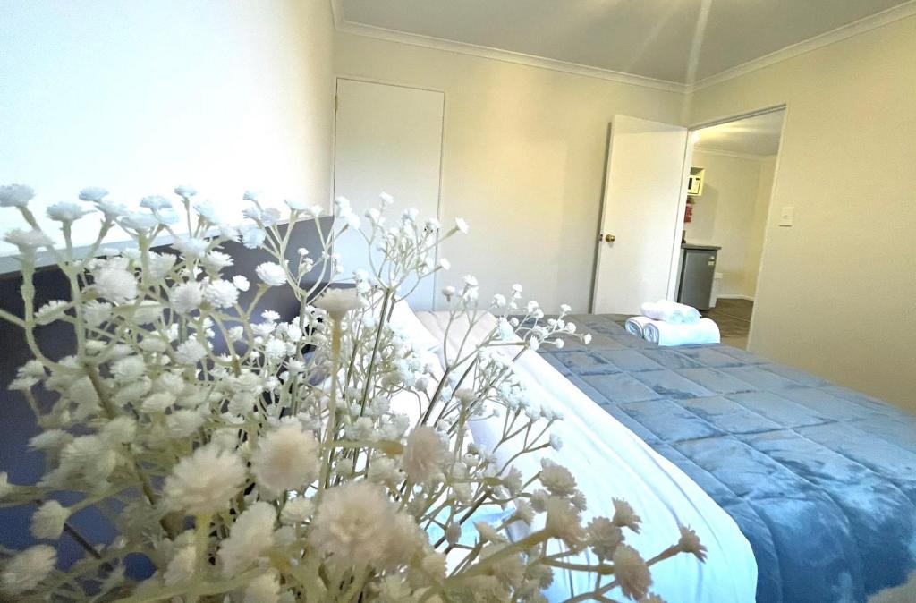 Postel nebo postele na pokoji v ubytování Alcala Motor Lodge