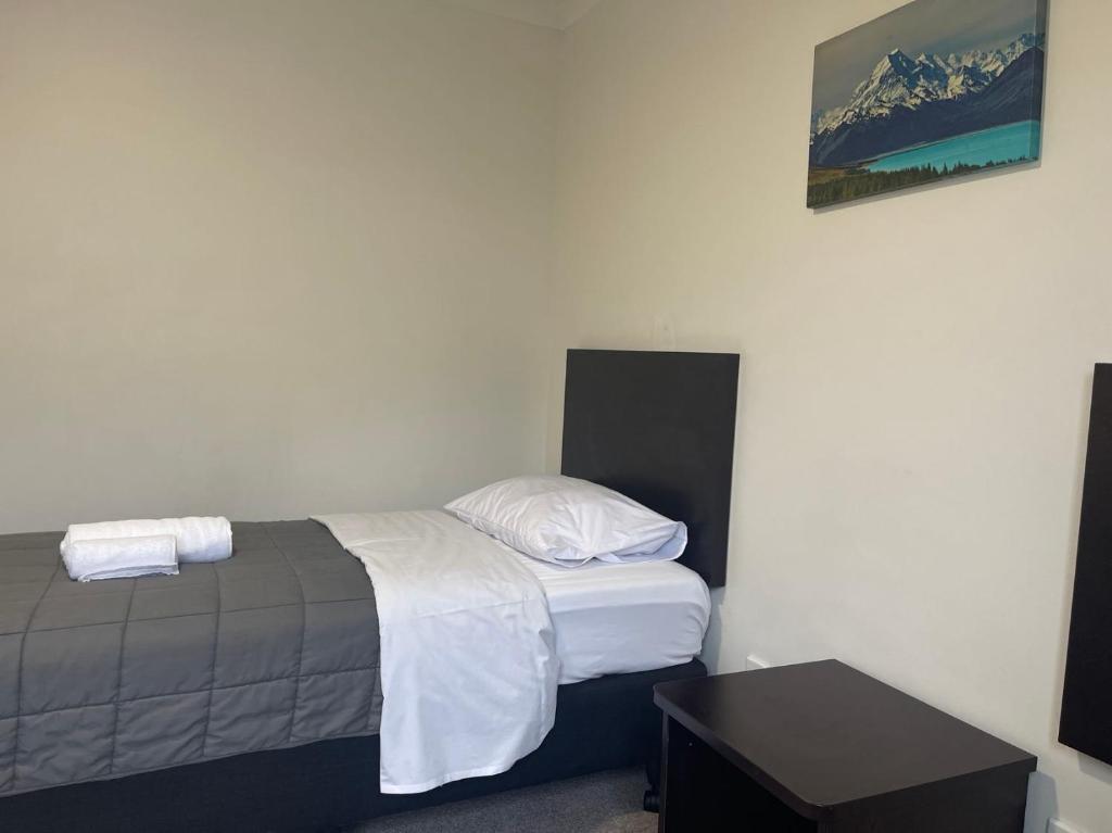 Postel nebo postele na pokoji v ubytování Alcala Motor Lodge