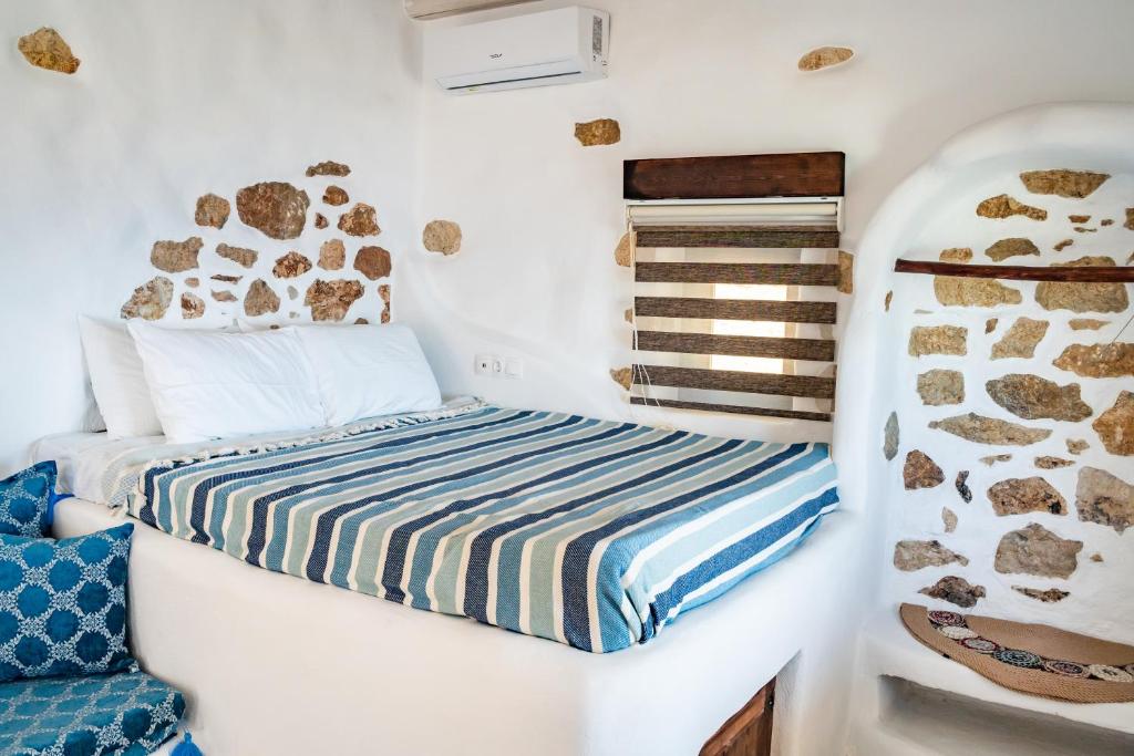 Postel nebo postele na pokoji v ubytování Aegean View Villa
