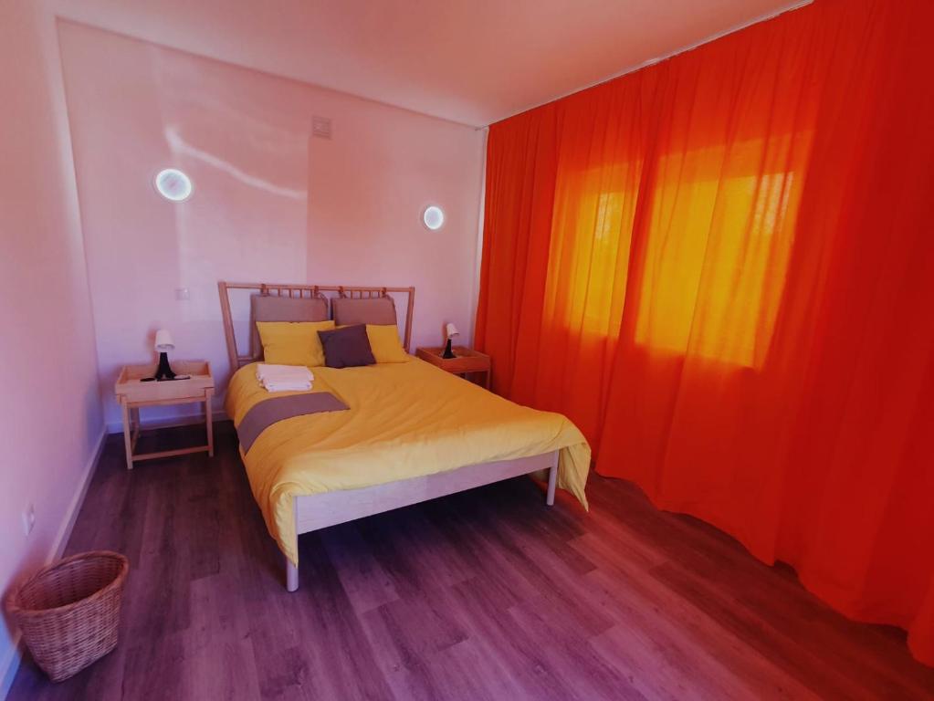 Ένα ή περισσότερα κρεβάτια σε δωμάτιο στο 4WD Solitaire Lodge