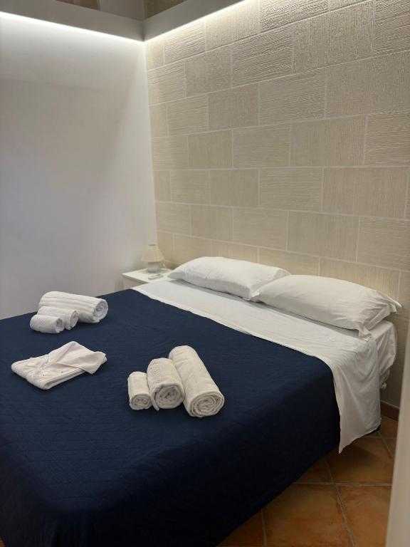Postel nebo postele na pokoji v ubytování "L'Oasi di Favignana" Room and Charme
