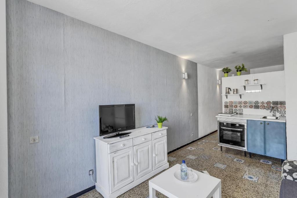 Una cocina o zona de cocina en Apartamento Con Encanto