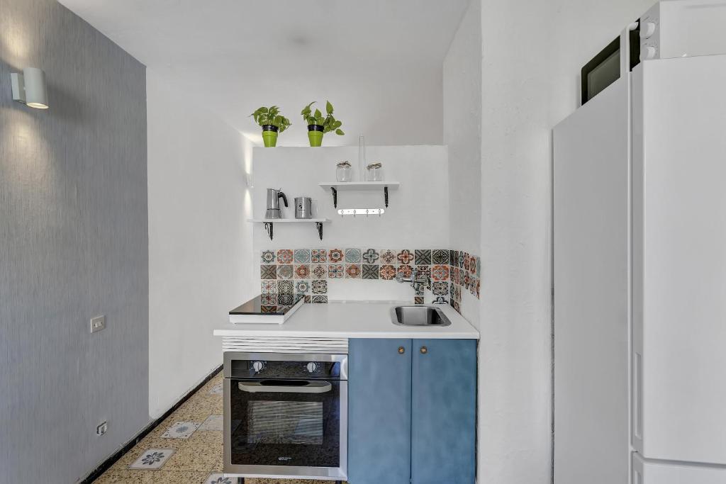 Una cocina o zona de cocina en Apartamento Con Encanto