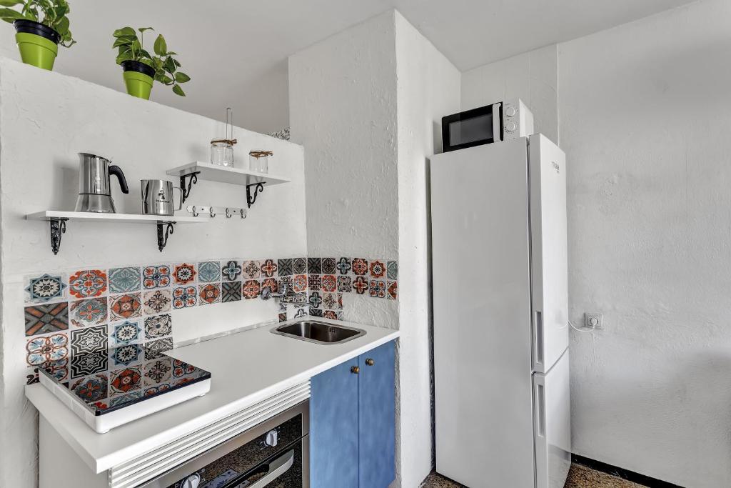 Una cocina o zona de cocina en Apartamento Con Encanto