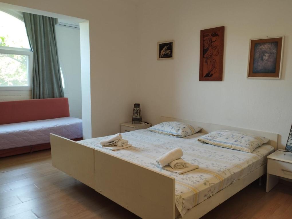 Postel nebo postele na pokoji v ubytování Borovik Guest House