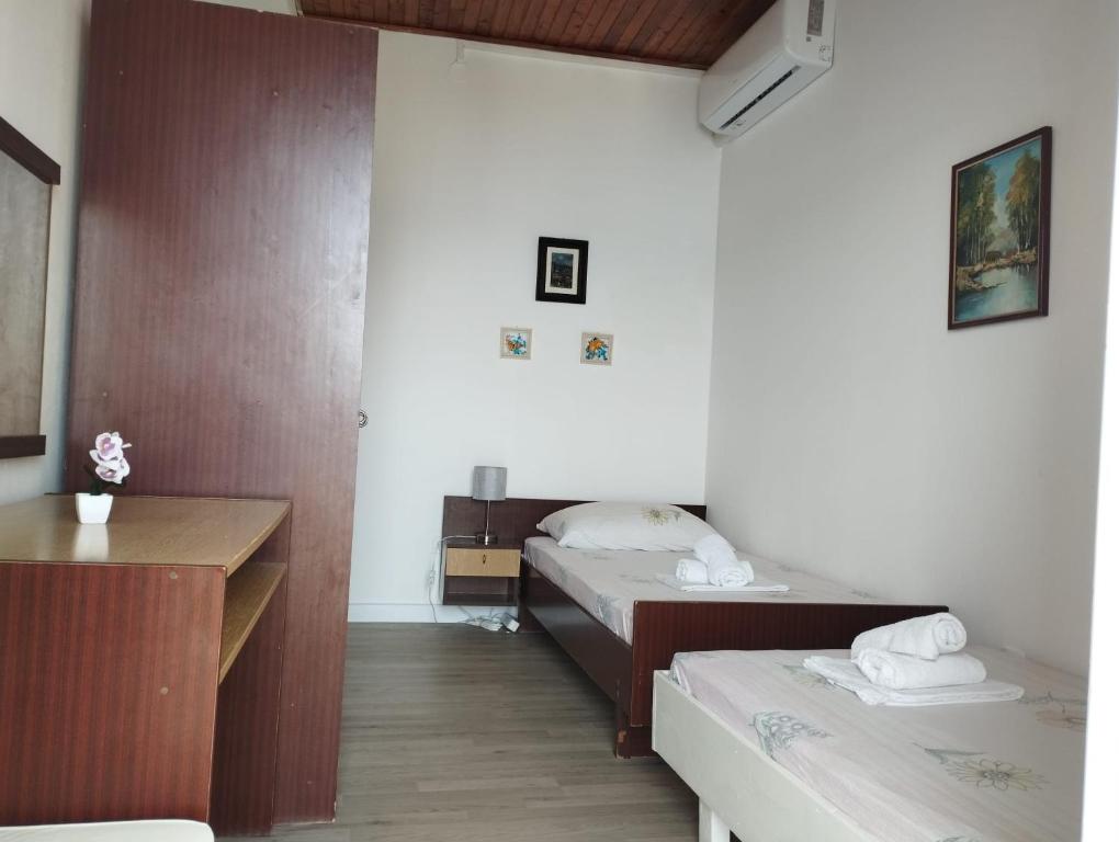 Postel nebo postele na pokoji v ubytování Borovik Guest House