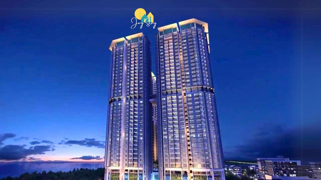 a tall building with a logo on top of it at Atlantis Residence l Luxury 3BR l 8-12pax l Jonker St l City Centre by Jay Stay in Melaka