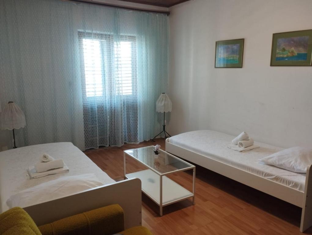 Postel nebo postele na pokoji v ubytování Borovik Guest House