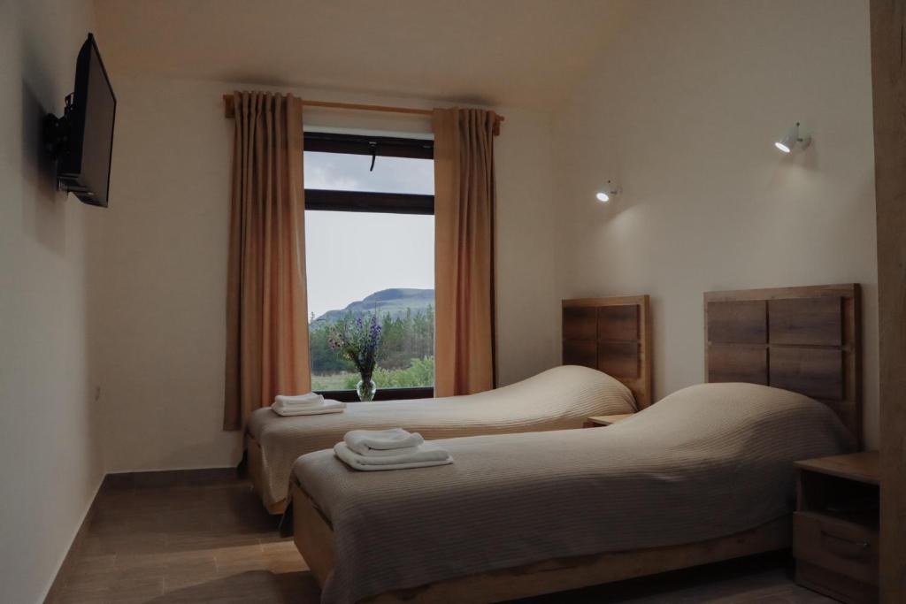 Postel nebo postele na pokoji v ubytování Sevan - Artanish Beach Resort