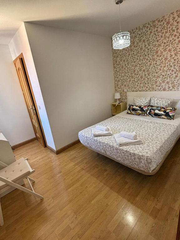 Postel nebo postele na pokoji v ubytování Hostal New Dream Madrid