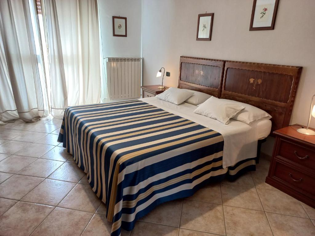 Postel nebo postele na pokoji v ubytování Cascina Longoria