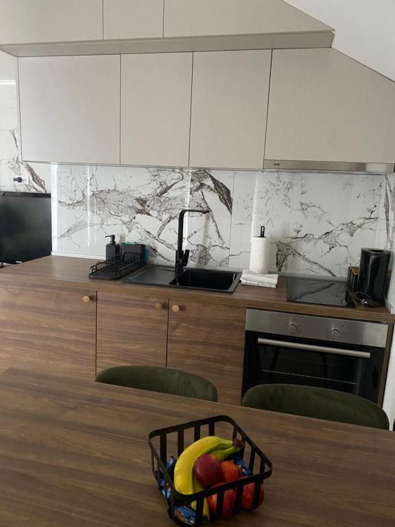 Kuchyň nebo kuchyňský kout v ubytování Apartmani Lazarevic Jagodina