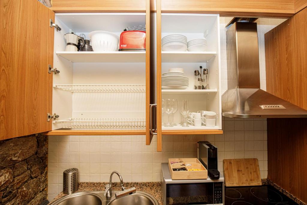 Kuchyň nebo kuchyňský kout v ubytování El Refugi de les Basses Apartament