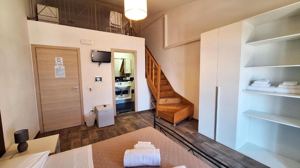 Postel nebo postele na pokoji v ubytování B&B A Mare