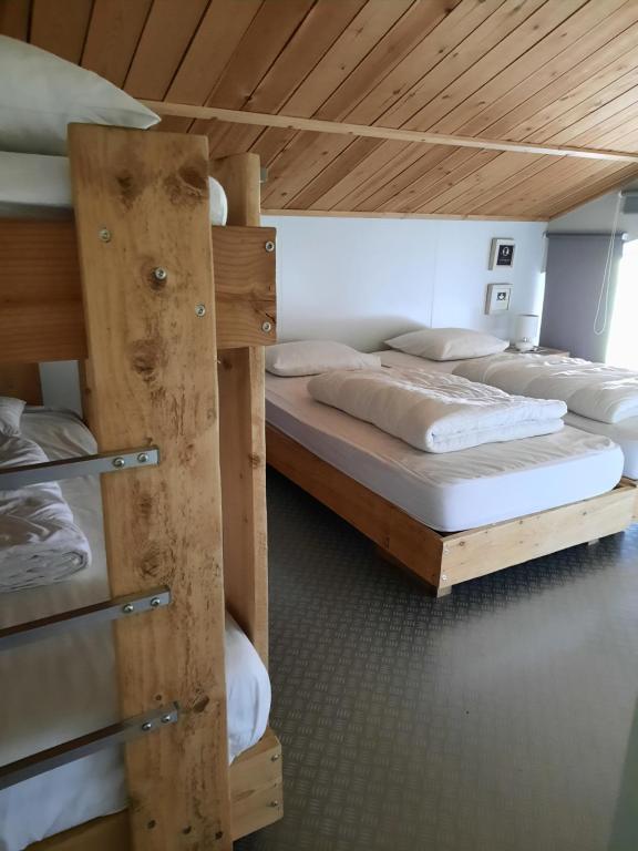 Postel nebo postele na pokoji v ubytování Eeuwenhout vakantiedomein