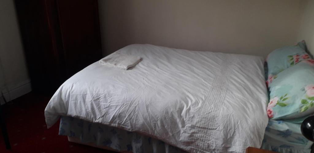 Postel nebo postele na pokoji v ubytování Spectrum Guest House