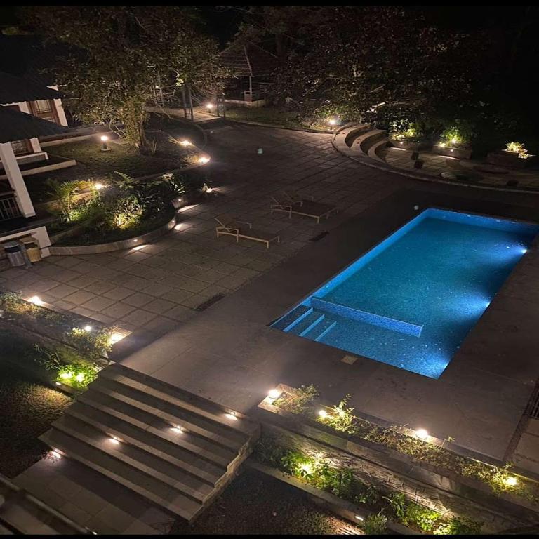 Bazén v ubytování Elixir Woods Luxury Resort And Spa, Munnar nebo v jeho okolí