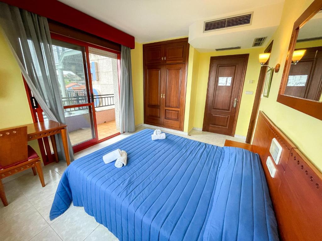 Posteľ alebo postele v izbe v ubytovaní Hotel Acquamaris 3000