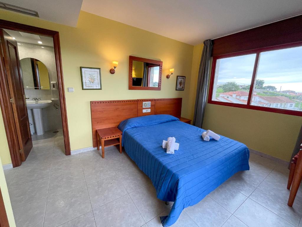 Posteľ alebo postele v izbe v ubytovaní Hotel Acquamaris 3000