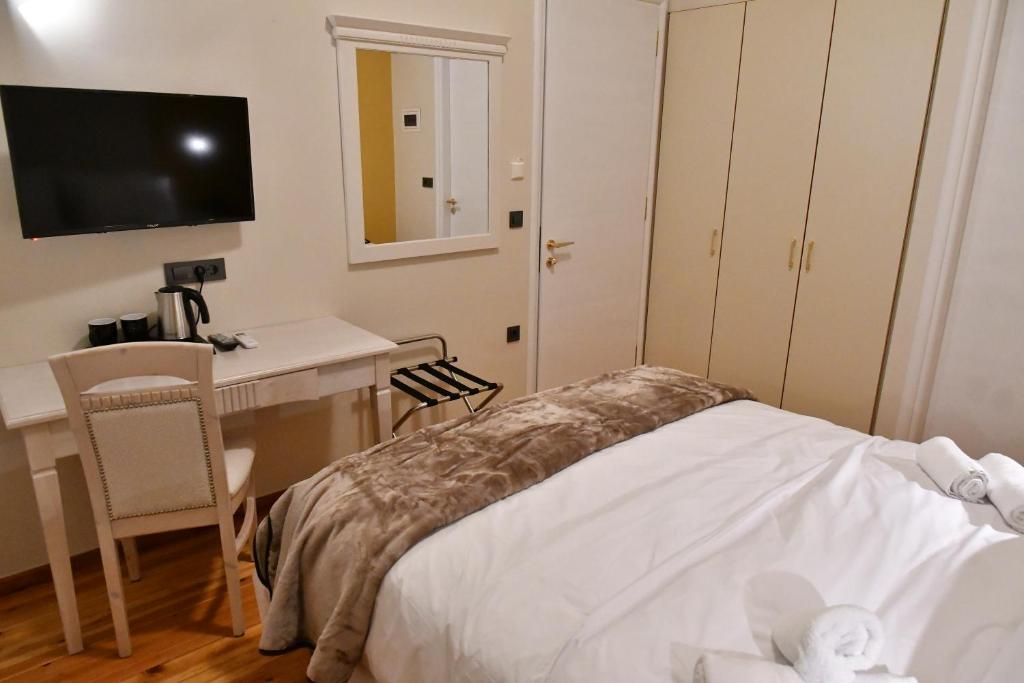 Postel nebo postele na pokoji v ubytování Porto Nafplio