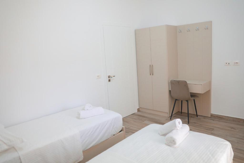 Postel nebo postele na pokoji v ubytování Amla's Villa