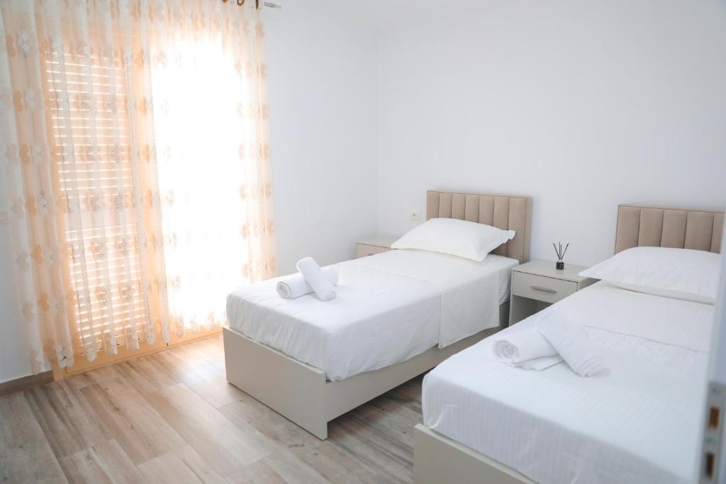 Postel nebo postele na pokoji v ubytování Amla's Villa
