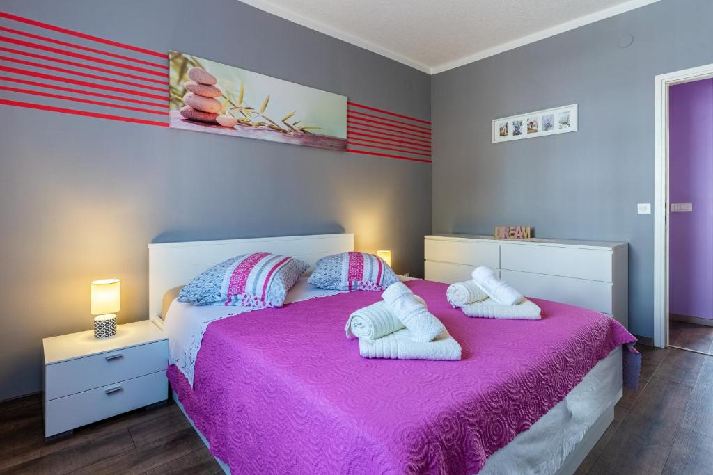 Postel nebo postele na pokoji v ubytování Apartman Laura