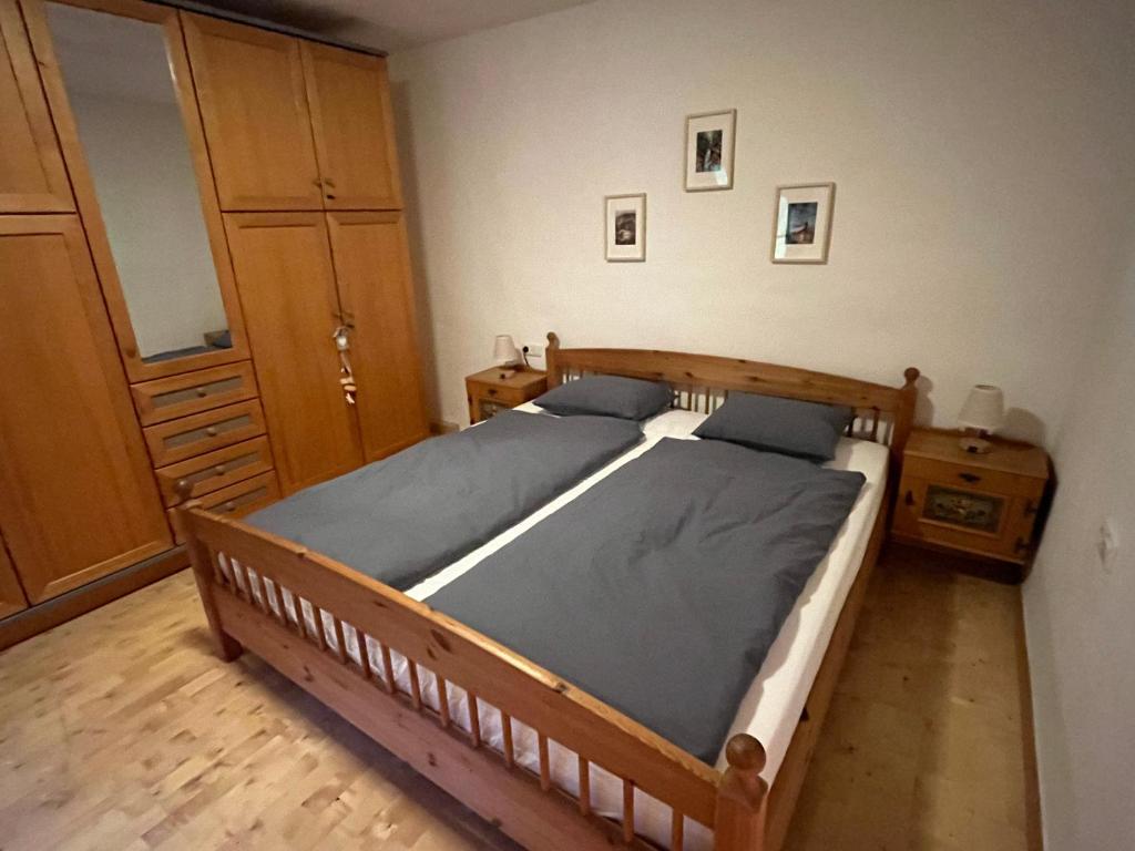 Postel nebo postele na pokoji v ubytování Haus am Wald -FeWo 2