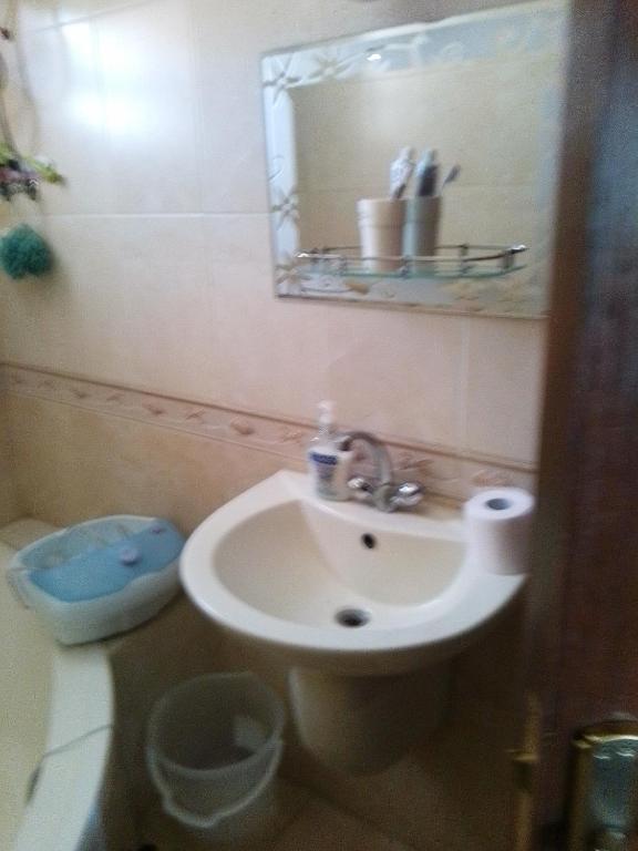 Koupelna v ubytování Ayola Apartment