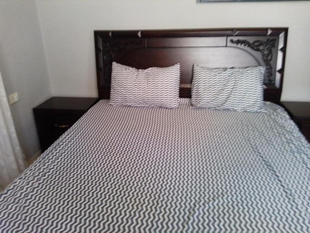 Postel nebo postele na pokoji v ubytování Ayola Apartment