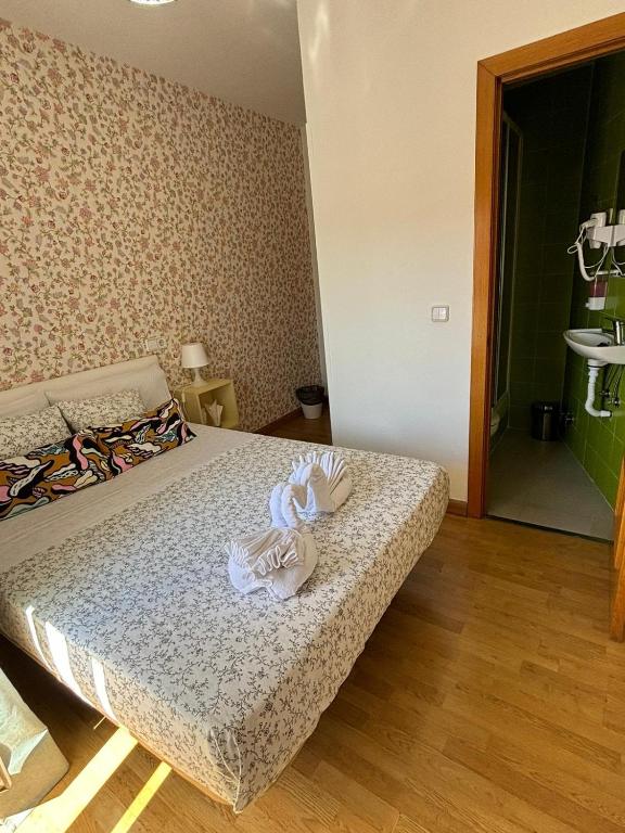 Cama o camas de una habitación en Hostal Flat55Madrid