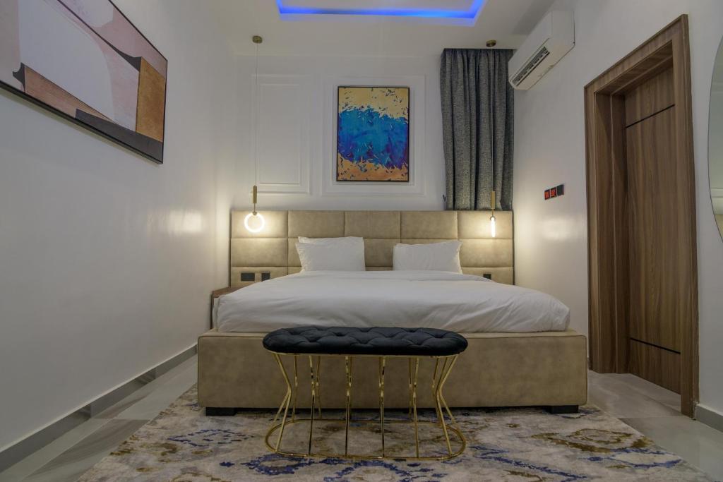 Postel nebo postele na pokoji v ubytování One90 Apartment