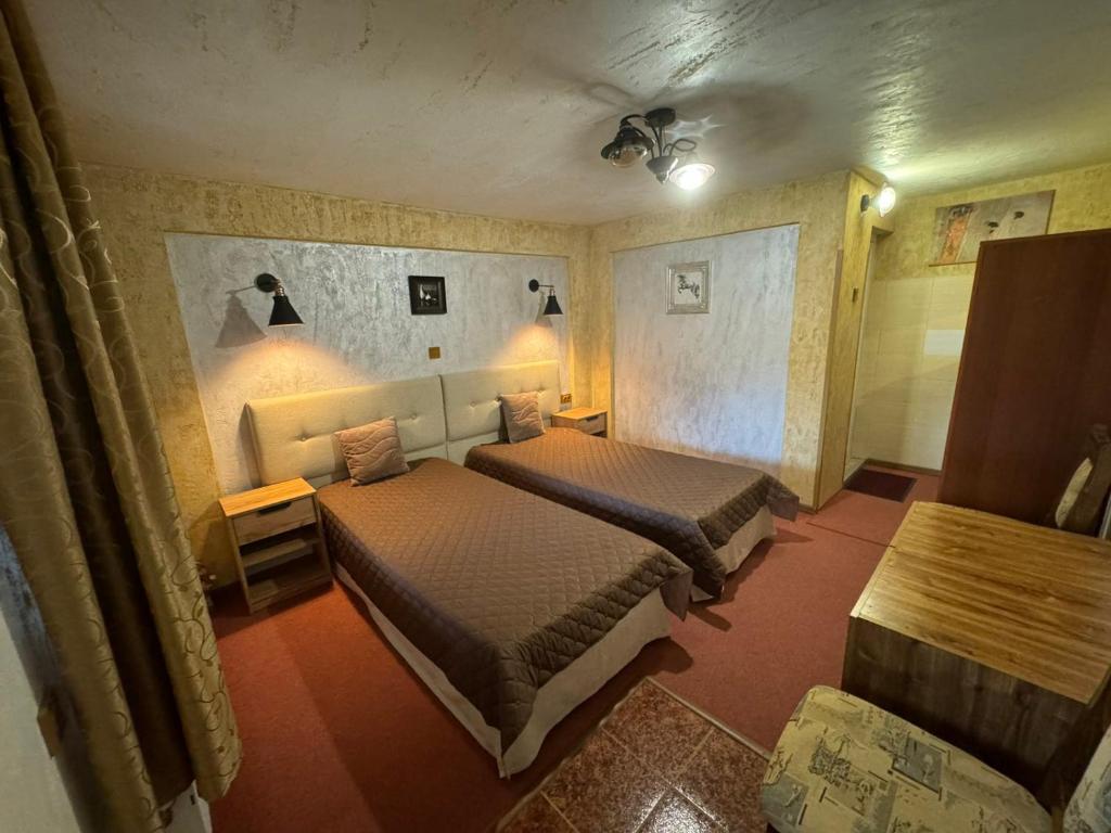 Postel nebo postele na pokoji v ubytování Guest House Ivan
