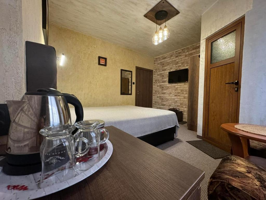 Postel nebo postele na pokoji v ubytování Guest House Ivan