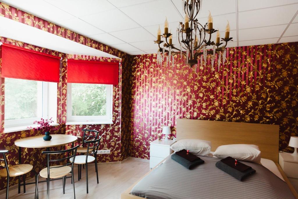 Postel nebo postele na pokoji v ubytování Konrad Family Guesthouse