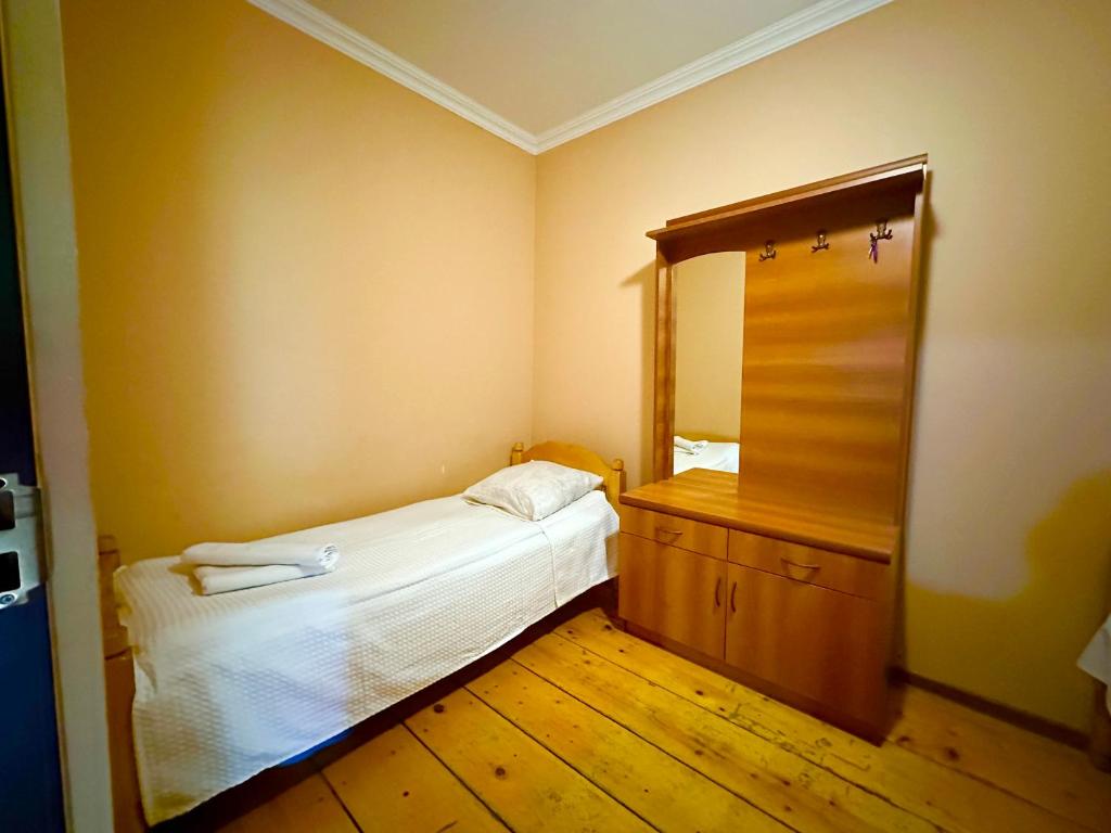 Postel nebo postele na pokoji v ubytování Mziuri Guest House
