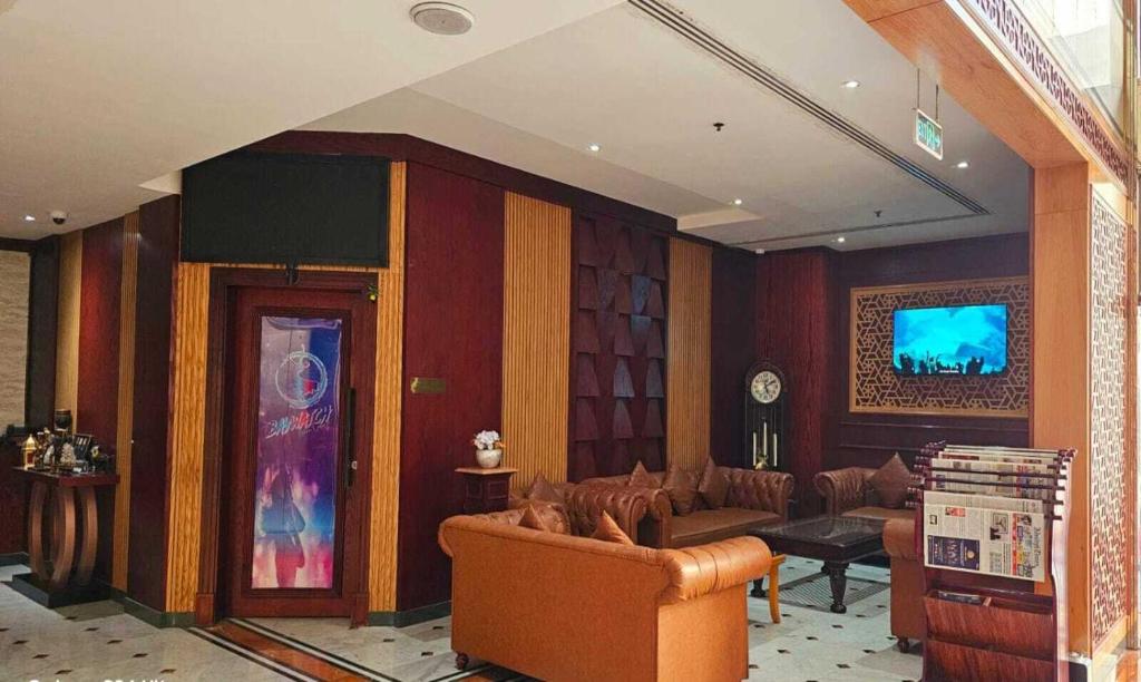 TV a/nebo společenská místnost v ubytování Concorde Deira Hotel -Formerly Golden Tulip Deira Hotel