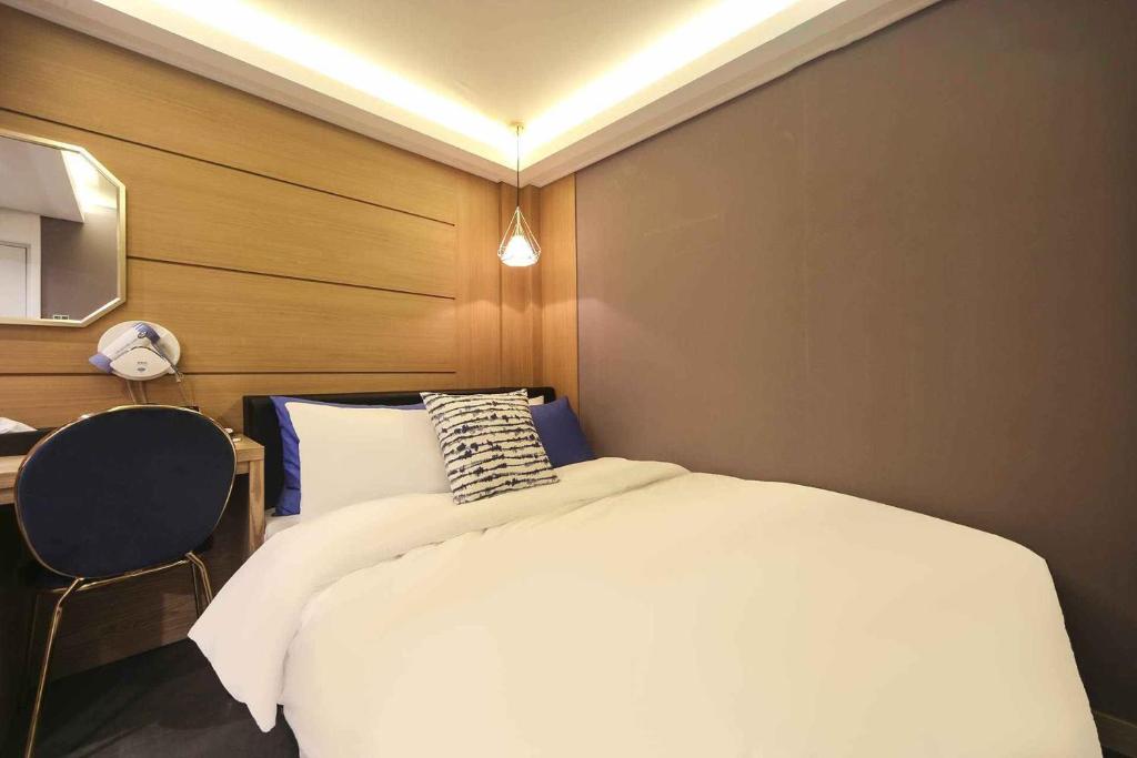 Postel nebo postele na pokoji v ubytování Bay 202 Hotel