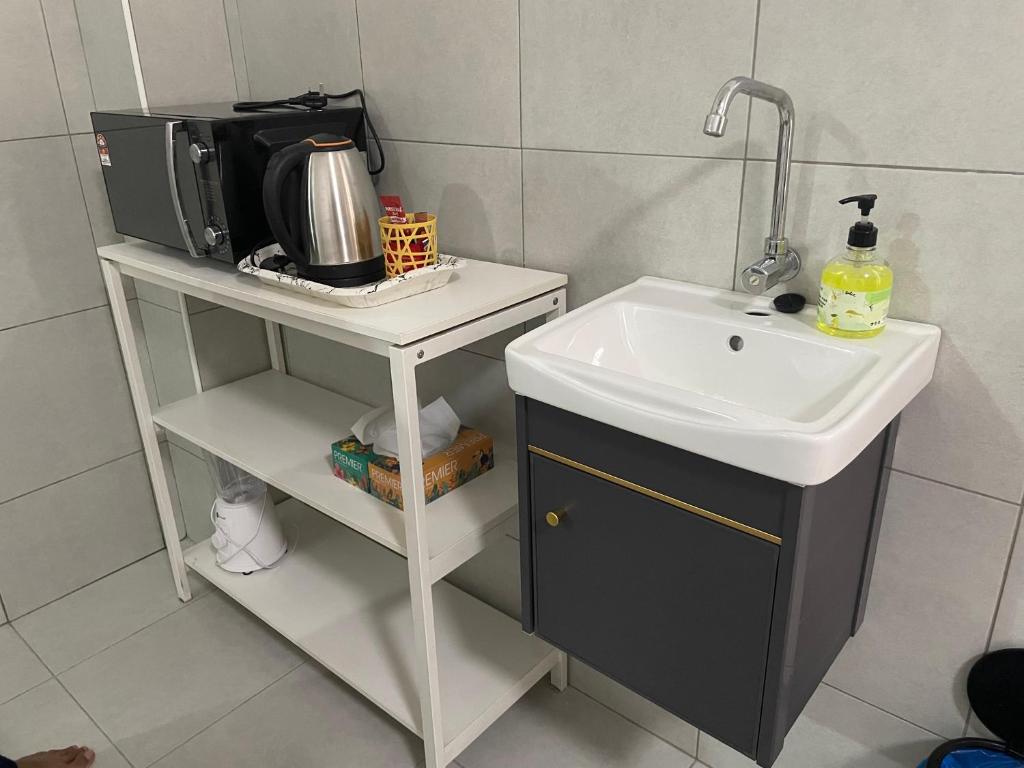 Kuchyň nebo kuchyňský kout v ubytování DM Homestay
