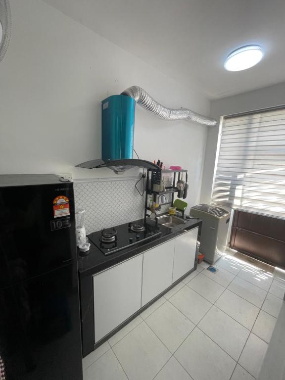 Kuchyň nebo kuchyňský kout v ubytování DM Homestay