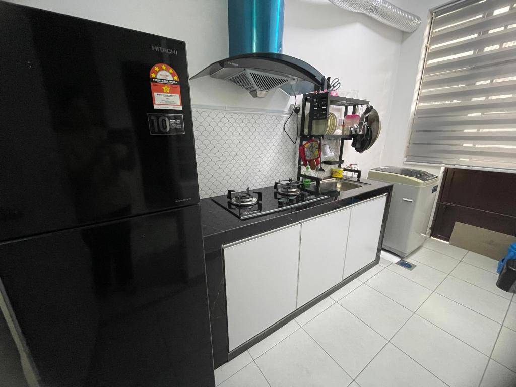Kuchyň nebo kuchyňský kout v ubytování DM Homestay