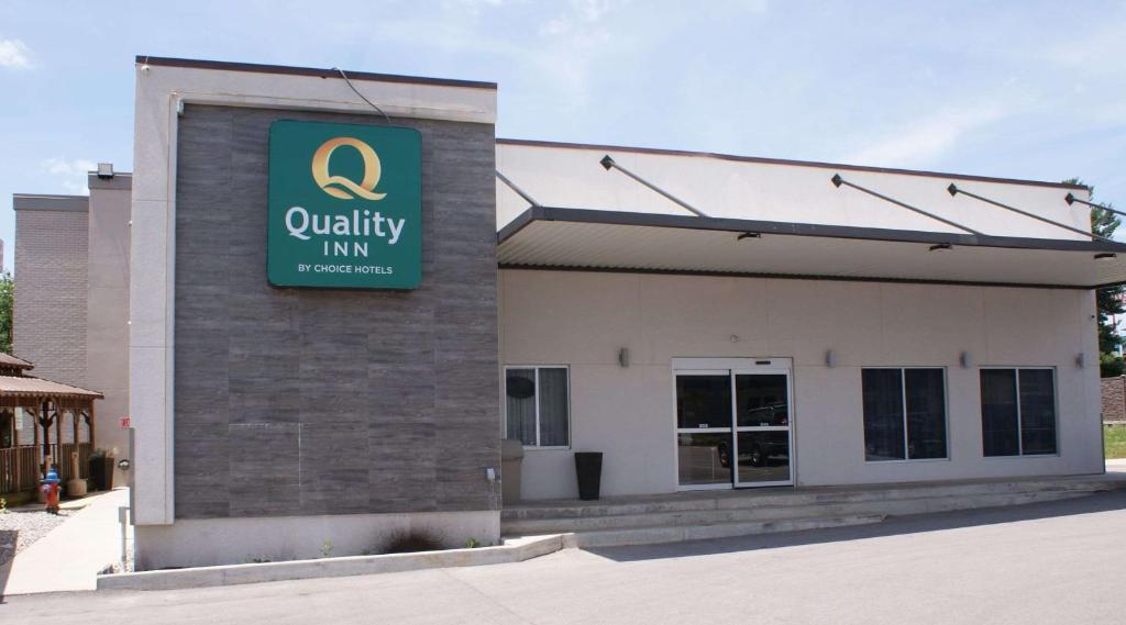 a building with a sign on the side of it at Quality Inn Cookeville in Cookeville
