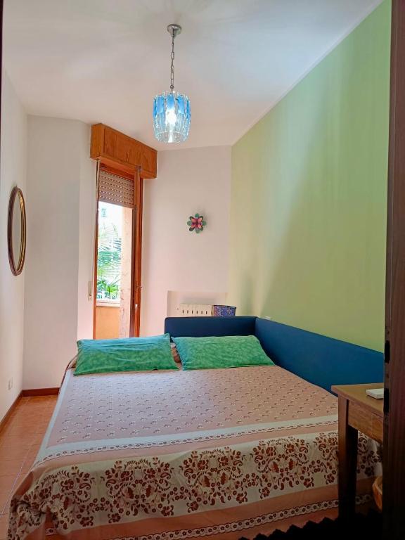 Łóżko lub łóżka w pokoju w obiekcie Casa Lucy
