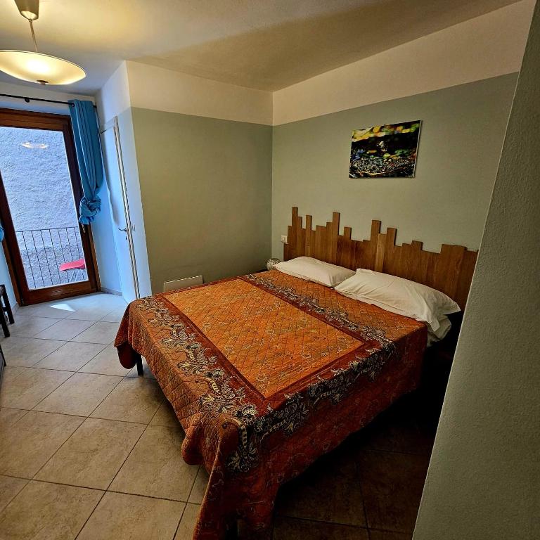 Postel nebo postele na pokoji v ubytování Borgo Paradiso Guest House
